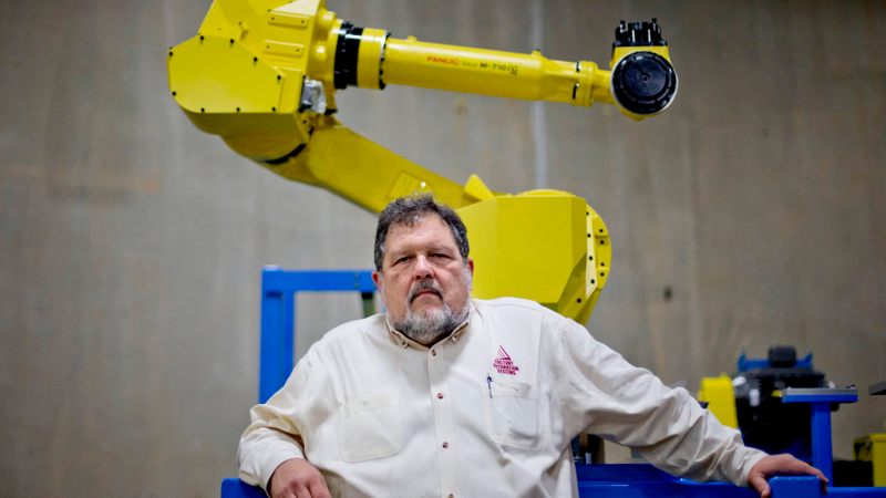Illustration for article titled 18 Gorgeous Images of Job-Stealing Factory Robots